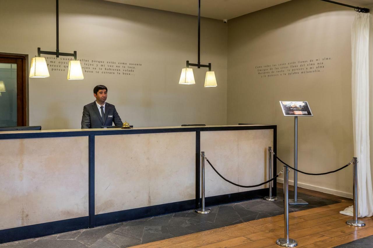 Enjoy Puerto Varas Exterior photo The reception desk at the hotel